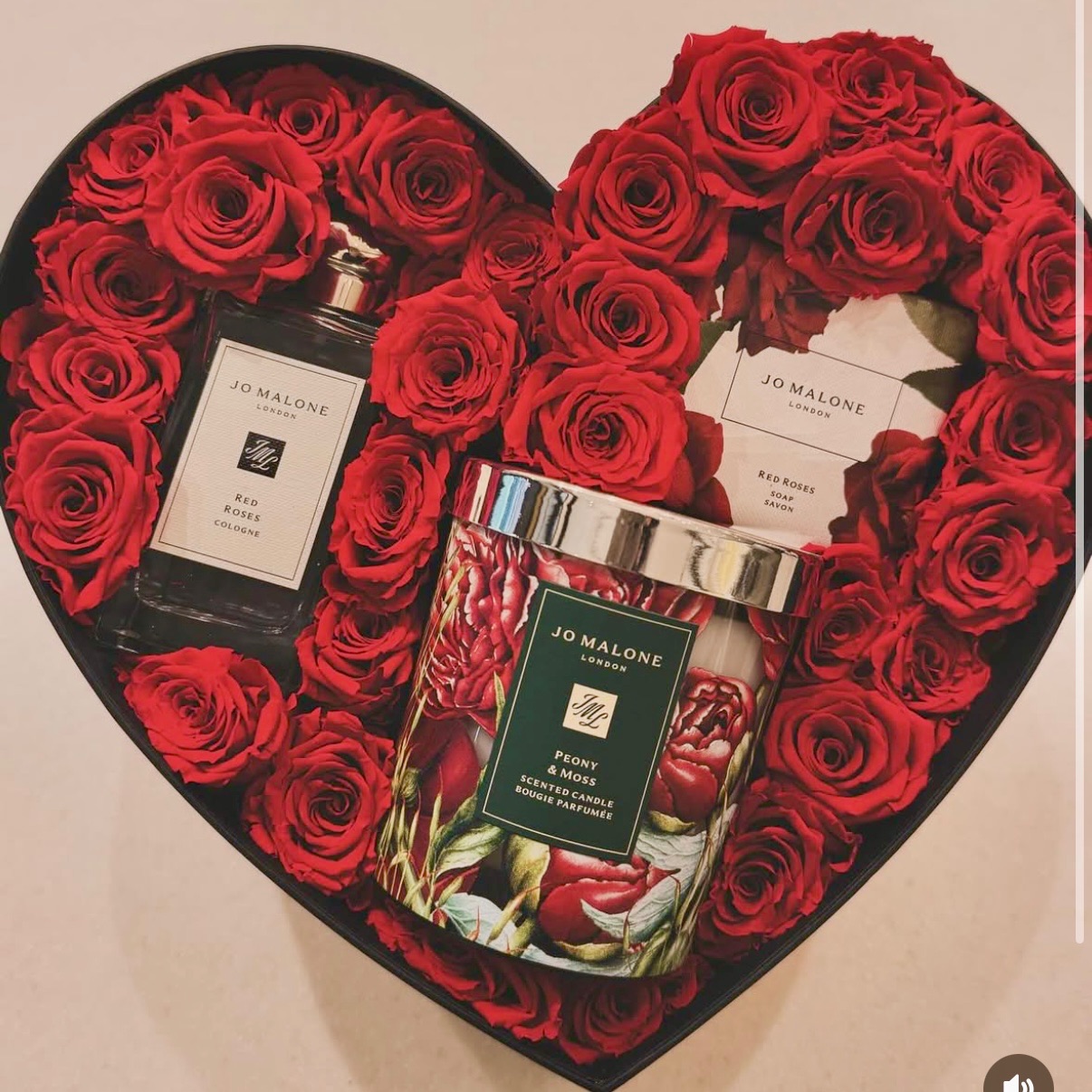 Jo Malone gift box with floral arrangement by Penny + Clover